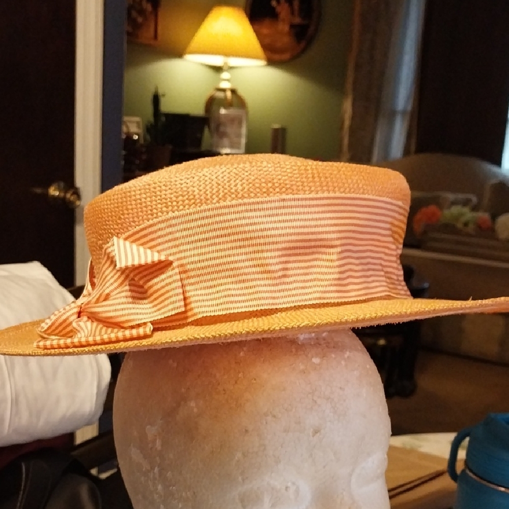 Elegant Orange Straw Boater Hat With Elastic Chin Strap.